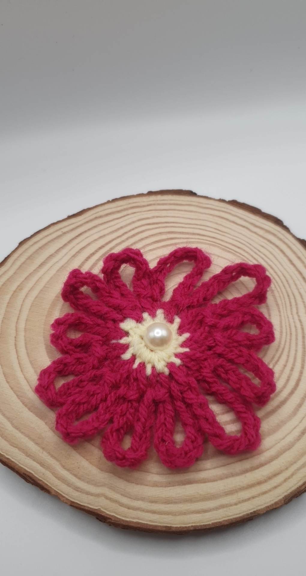 Crochet flower brooch